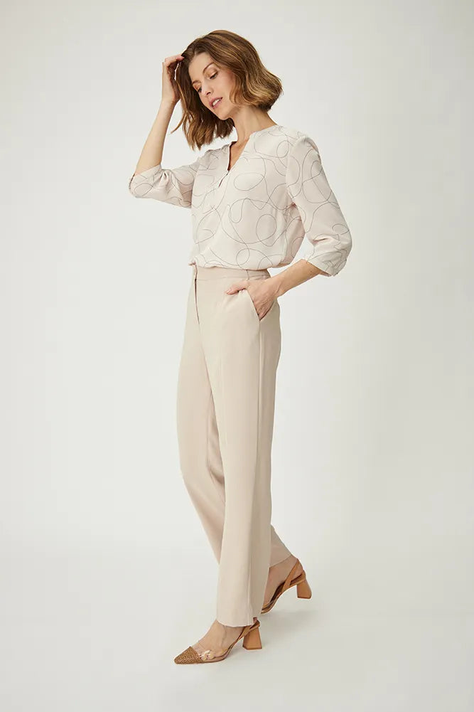 Pantalón Mujer Con Corte En Piernas Beige