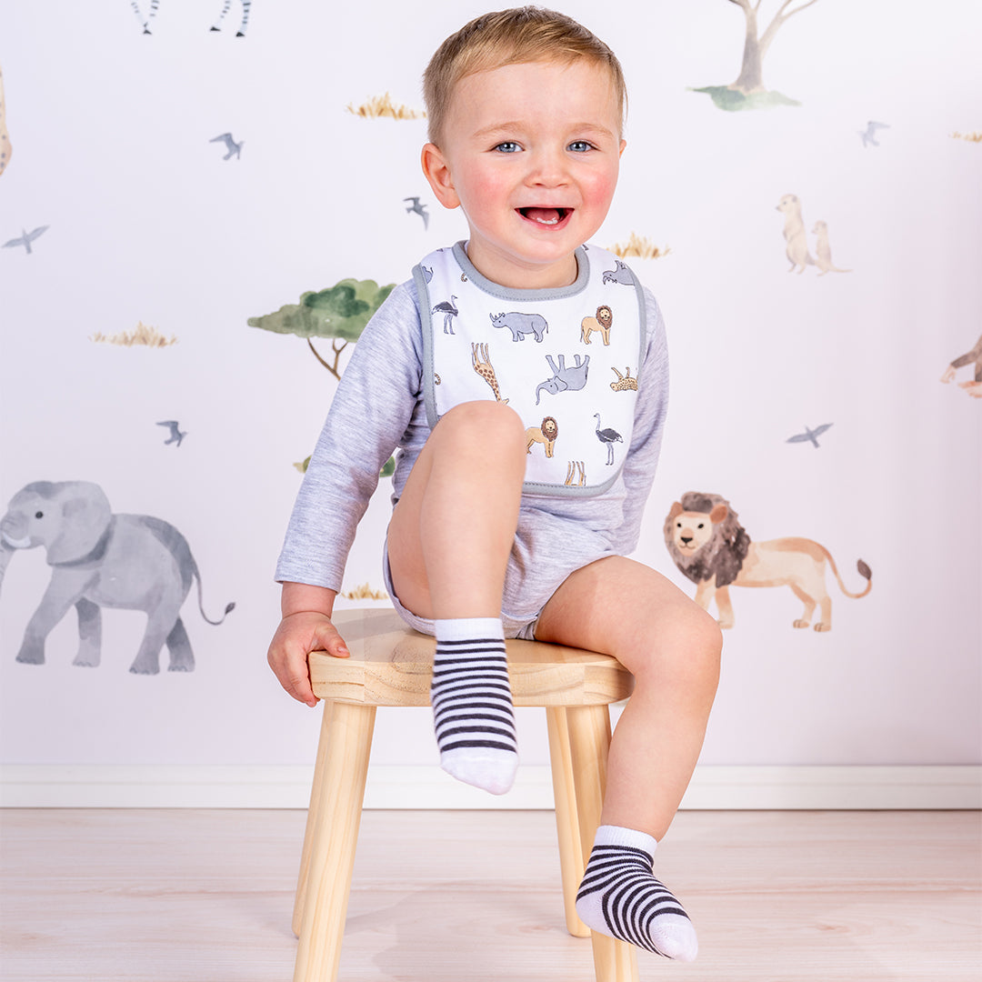 Set Babero + Calcetín Beige