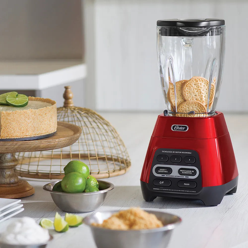 Licuadora roja con programas automáticos, tecnología reversible y vaso Blend