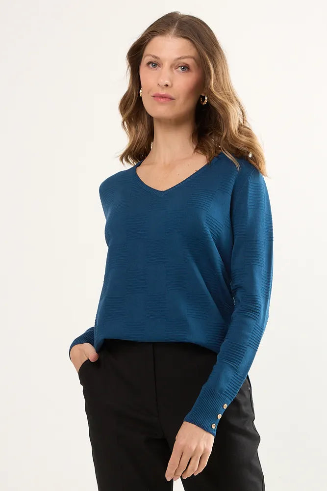 sweater-mujer-con-diseño-de-cuadros-petroleo
