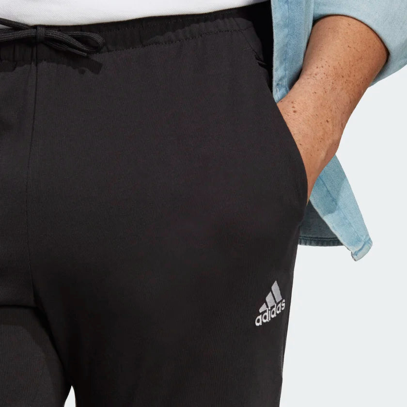 Pantalón Hombre Essentials Tejido Jersey Con Pierna Cónica y Puño Elástico Black