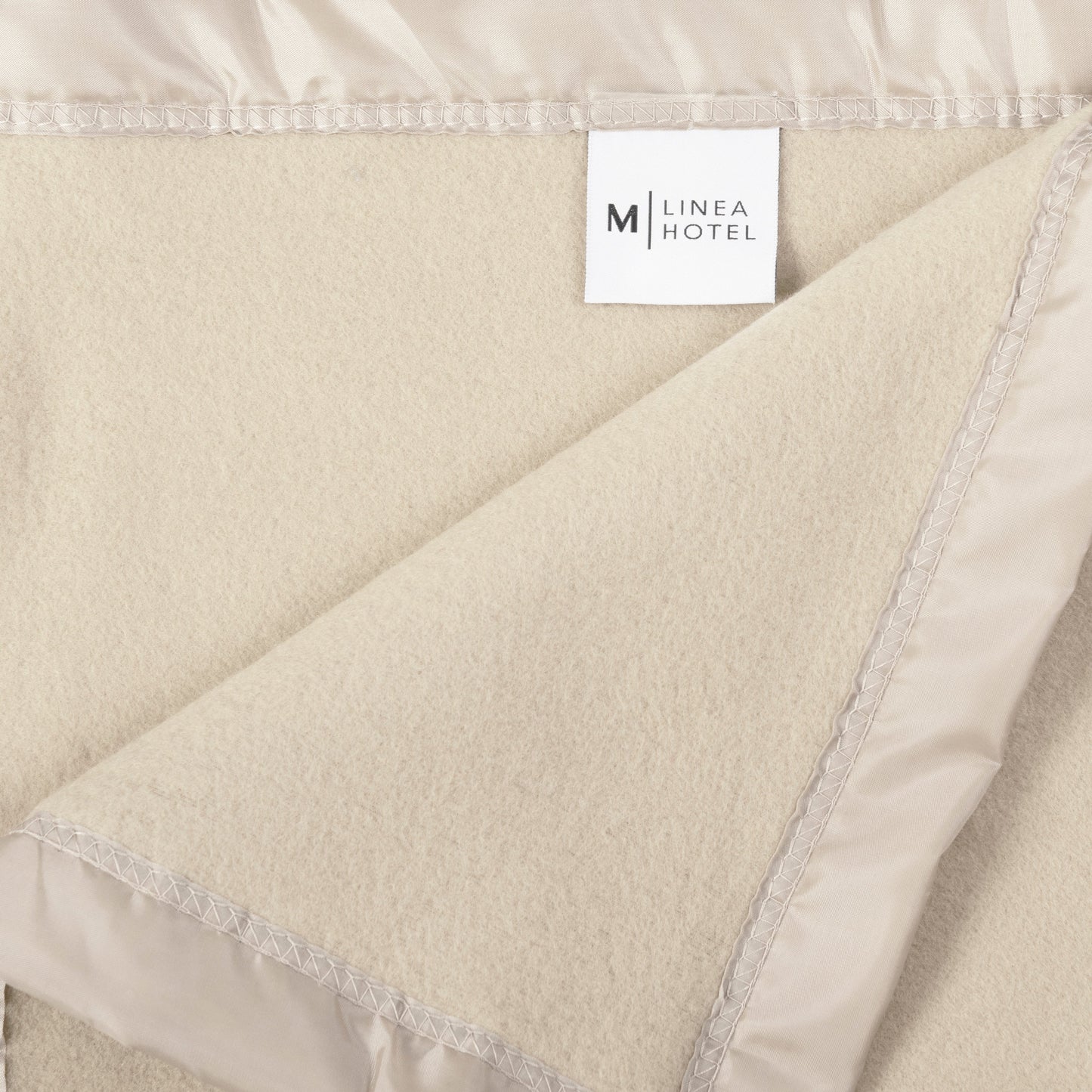 Frazada Polar Borde Satin Linea Hotel Crudo