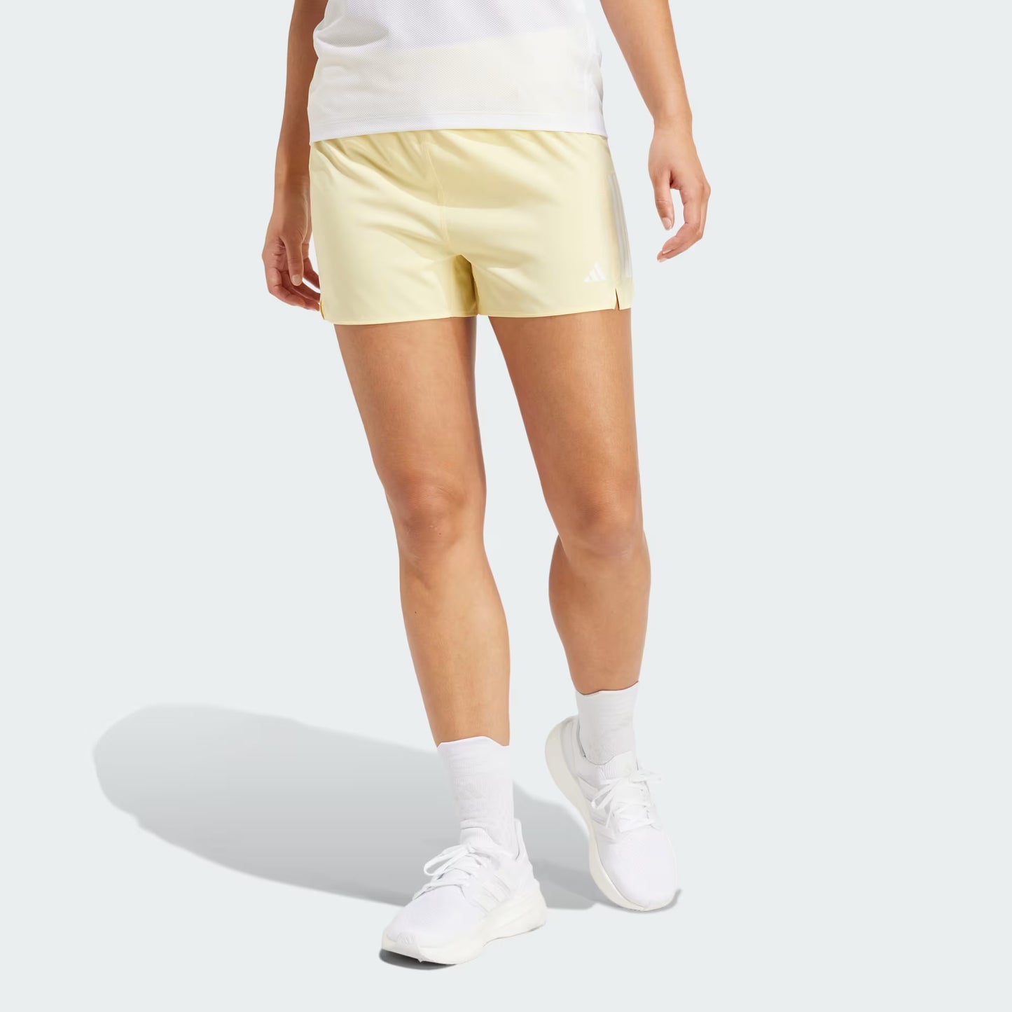 Shorts Mujer Running Own the Run Semi Almost Yellow