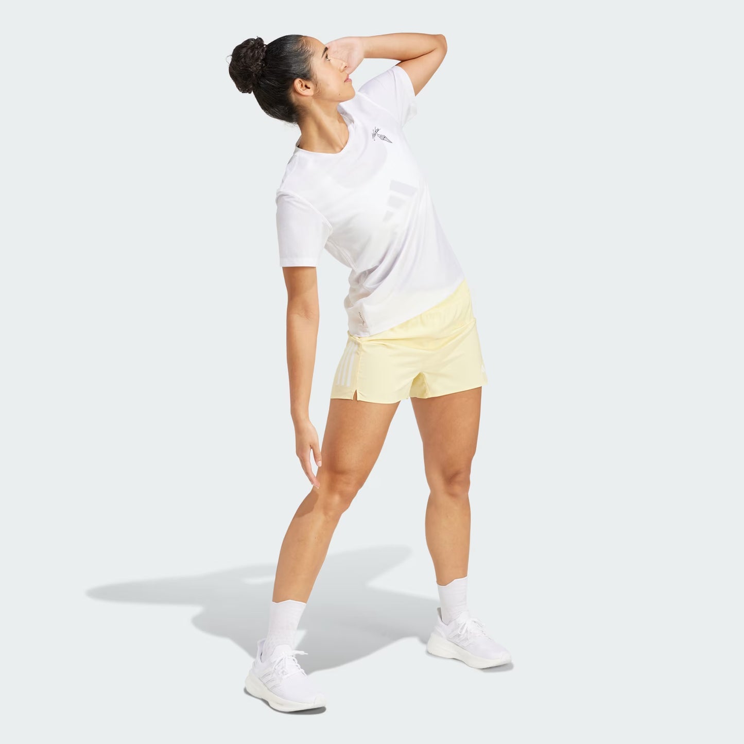 Shorts Mujer Running Own the Run Semi Almost Yellow