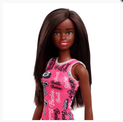 Muñeca Niña Morena Vestido Con Estampado Rosa