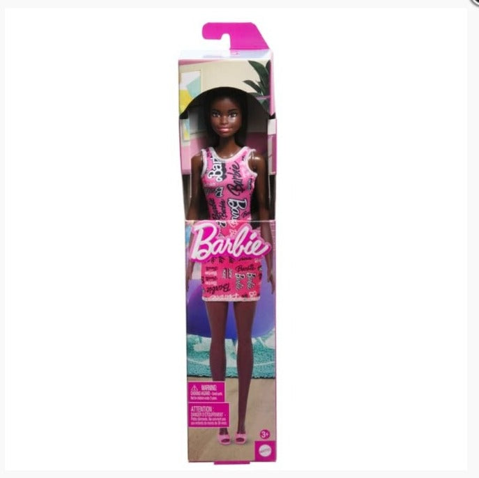 Muñeca Niña Morena Vestido Con Estampado Rosa