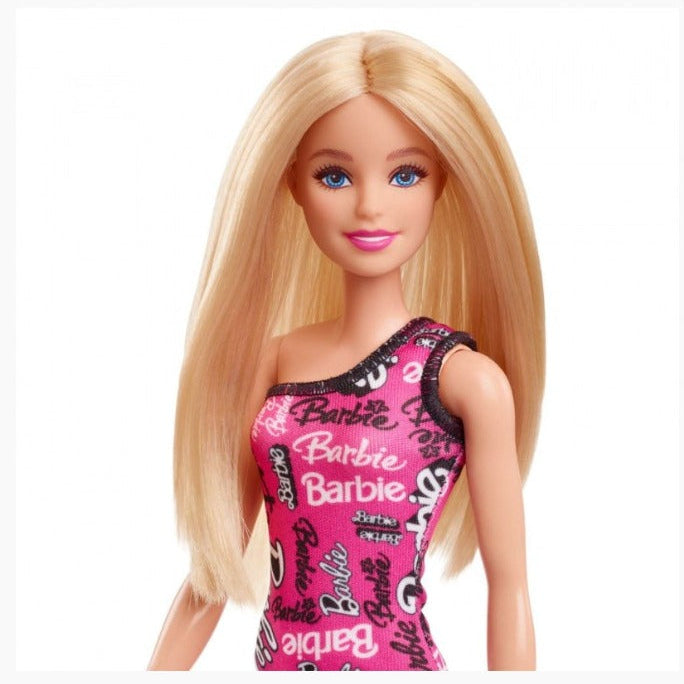 Muñeca Niña Rubia Vestido Con Estampado Rosa